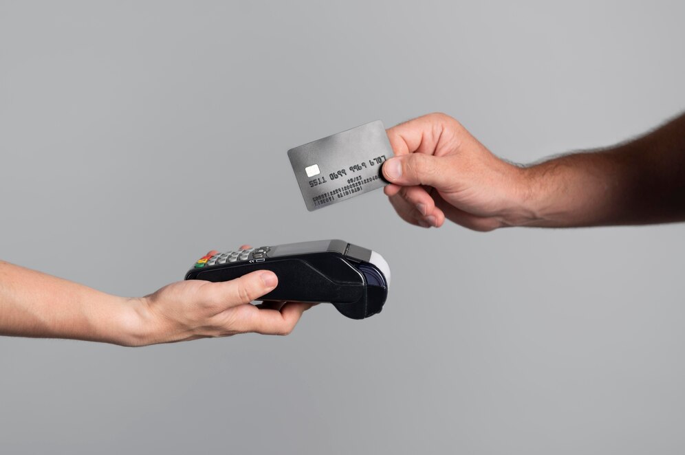 man using his credit card pay product